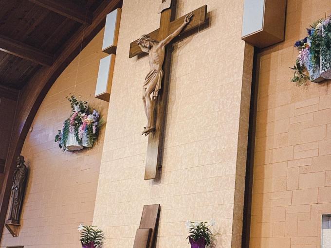 inside a church with cross in middle